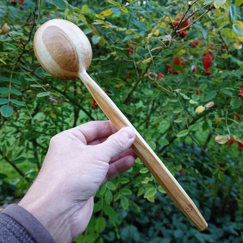 Wooden scoop back side.