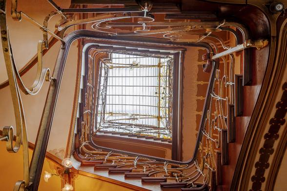 Low angle shot of the  spectacular Art Nouveau style stairwell flooded with light  filtered through a skylight at the Horta Museum Mansion by architect Victor Horta in Brussels (1901) 
This mansion became the private house and studio of Victor Horta and is now a Unesco Word Heritage.