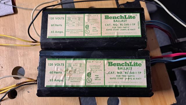 Two solid ballasts from a tube light fixture:
120 VOLTS BenchLite BALLAST
CAT. NO/RL-240-1-TP
FOR TWO F40T12 RAPID START LAMPS 40 WATT
