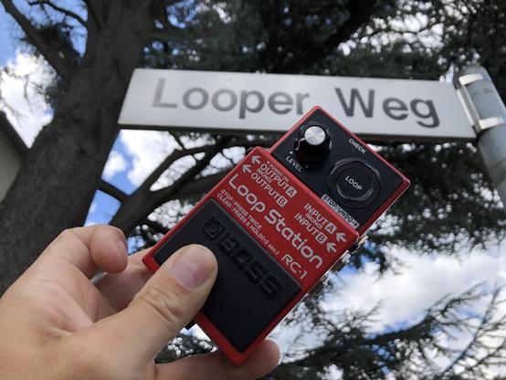 Street sign "Looper Weg" in Cologne, Germany. I took a picture of it with holding one of my Looper pedals in front of it, a BOSS RC-1 in this case.