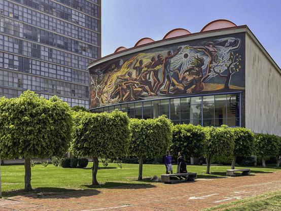 Photo of auditorium building on UNAM campus in Mexico City with mural