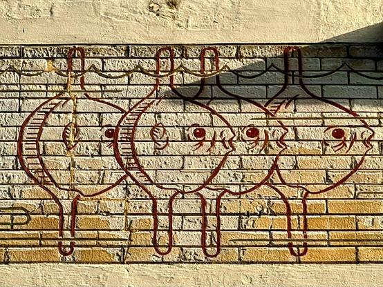 A mural featuring four sunfish.