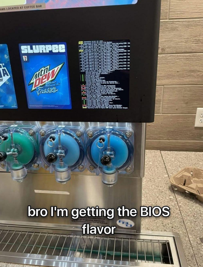 Photo of a "Slurpee" frozen drink machine.  The far-right hand screen shows a Linux boot sequence (distribution unknown, but it looks like the typical `systemd` boot-spew to me, with lots of warnings and a few errors) on the vertical-format screen.

Caption: "bro I'm getting the BIOS flavor"