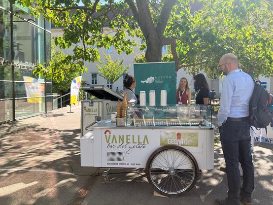 Photo: ice cream truck, vendor and customer