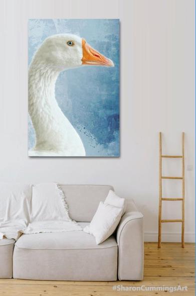 White goose on muted blue watercolor in a furniture setting by artist Sharon Cummings.