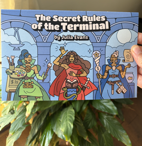 The Secret Rules of the Terminal, by Julia Evans - The cover illustration depicts three people doing arcane terminal magic in a temple with a smoking censer in the background. Each of the three people has curly brown hair and light brown skin. They are all wearing dresses, billowing cloaks, and utility belts with keyboard symbols on them. The one on the left holds a palette of paints and a brush. The one on the right has a staff with a $ symbol on it and a starfish at the top. The one in the centre has a sword and is reading from a book whose cover says “>_” and “./”, which rests on a lectern with a smiling snake wrapped around it.