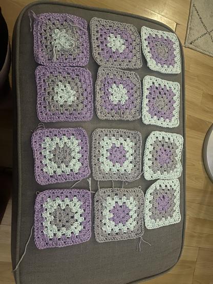 12 granny squares in gray, light purple and mint green