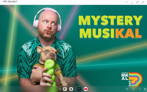 West in colorful shirt holding dog and a bright green skein of yarn, the theme Mystery MusiKal in upper right