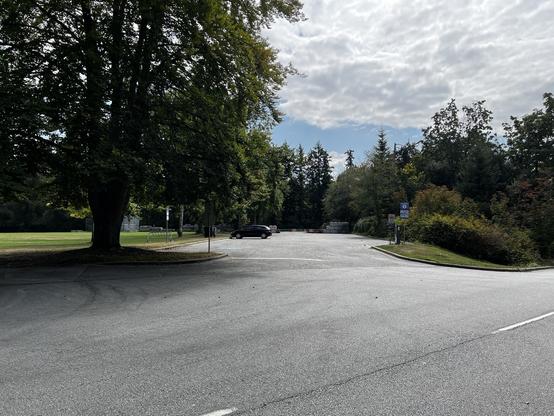 A very wide view of a parking lot on Prospect Point where the back half is closed to store dirt.