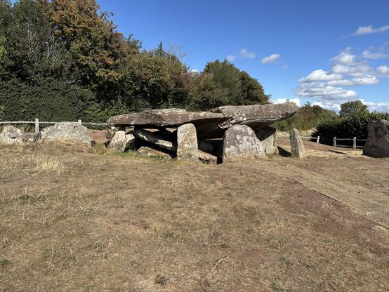 A structure of ancient stones forming a burial chamber.