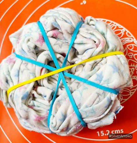 The scrap fabric tied up to make a spiral pattern when dyed.