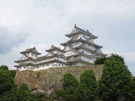 Seen inside the outer wall, the main structure stands on the massive stone foundation.
