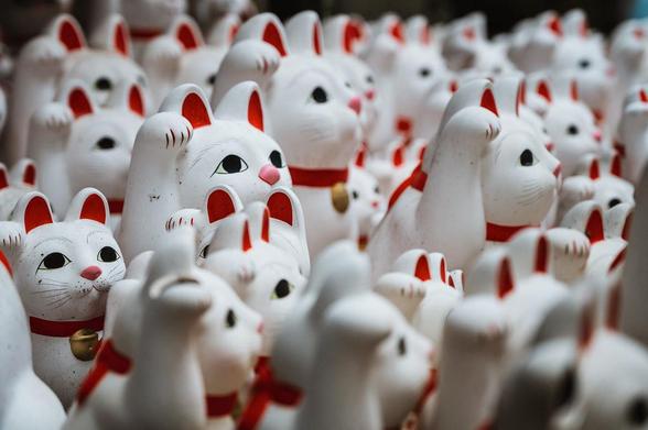 Lucky beckoning cat statues at the Gōtokuji Temple, Tokyo.