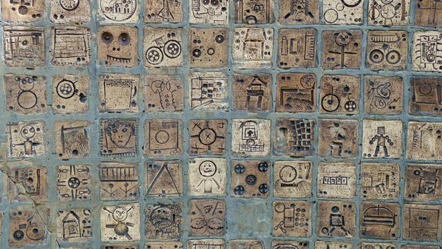 ceramic tiles designed by children for the Millennium Wall at Chippenham, Wiltshire, England.  September 2025