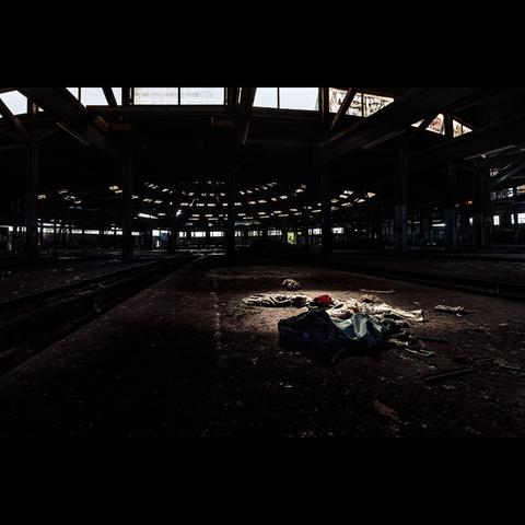 Abandoned trains hangar, with light on lost objects, Urbex, France