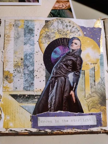 Scrapbook page of Chris harms from lord of the lost. He is a slim white man wearing a black coat, posing staring at the camera. There are starry paper backgrounds in circles and strips, and a lyric strips at the bottom saying "drown in the starlight"