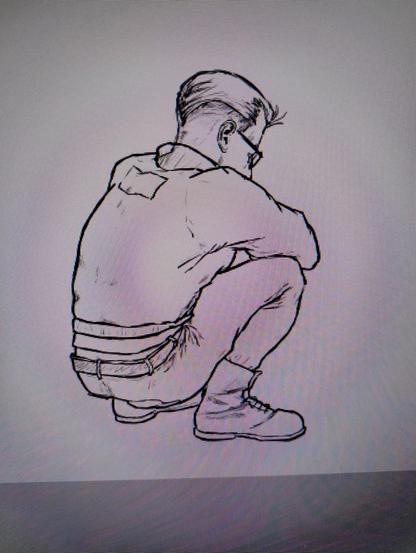 A photo of a pc monitor showing a sketch of a man crouching, facing away from the camera