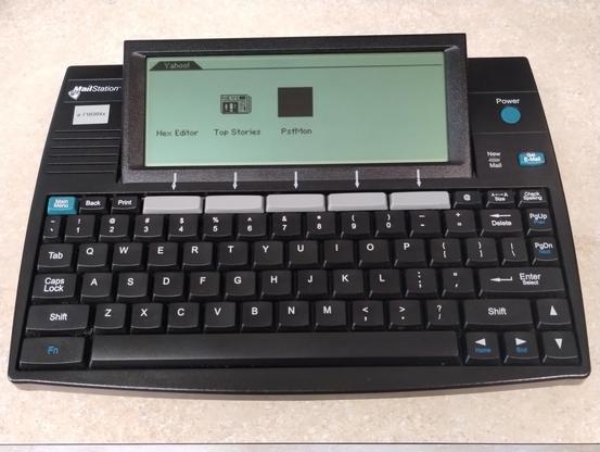 MailStation displaying three apps in its app launcher.  Hex Editor (blank icon); Top Stories (newspaper icon); PsfMon (blank icon displaying as a black square because the app is selected.)  Pressing Enter at this point would launch PsfMon.