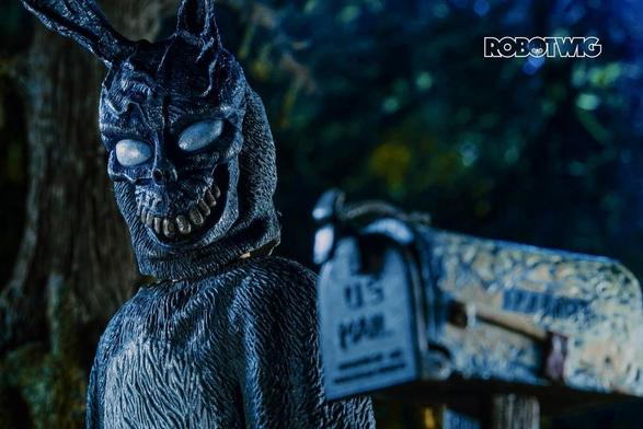 Frank stands next to Roberta Sparrows mailbox at night