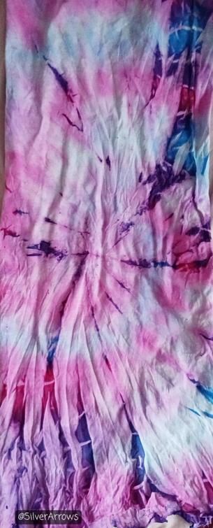 Top side of the tiedye pyjama scrap. The violet is quite deep and the magenta and cyan have come out quite well. The spiral pattern isn't too obvious but the colours are okay