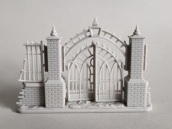 Wargames terrain - wall piece with wrought iron gate, front view.