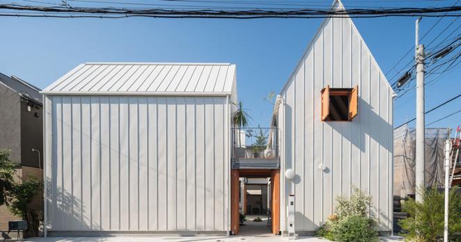 four interconnected volumes enclose courtyard house in tokyo by takeshi hosaka