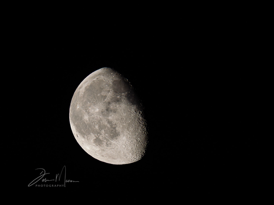 A shot of tonight’s waning gibbous moon where over half of the surface is lit