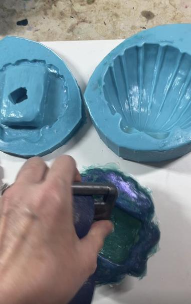 Removing the dive weight from the cavity in the silicone shell