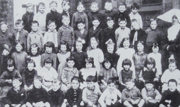 Pupils - and teacher Nun - of St. Columba's R. C. School in 1925, the year after they moved - controversially - to Causewayside School