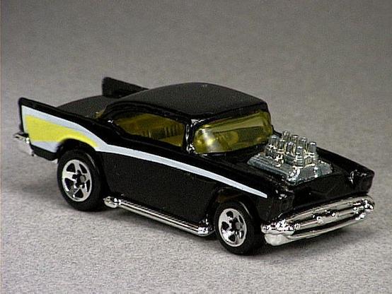 Released in 1993, Black `57 Chevy of Chevrolet 5 Pack with 5-Spoke wheels. Notes: Never released in blister. Tampo: White and yellow side tampo. Exposed metal engine. Packaging: 5 Pack. Metal Body, Plastic Base. Made in Malaysia. Scarcity: 2/10