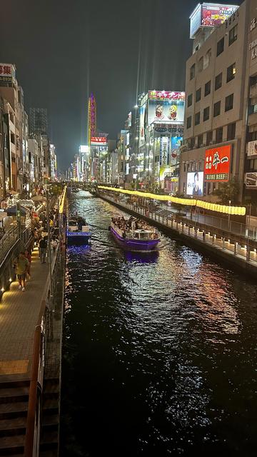Waterfront at Dotonbori Street in Osaka by night.
