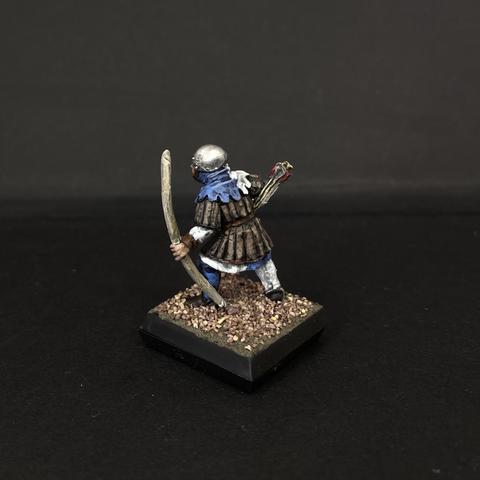 Reverse of the same mini, shows a bigger lump of the leather.
