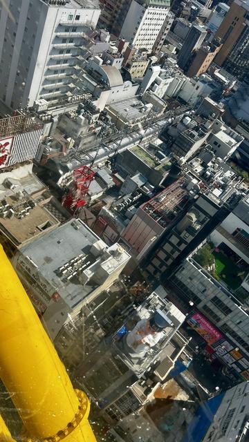 View from inside the ferriswheel cabin at the donki store in Osaka