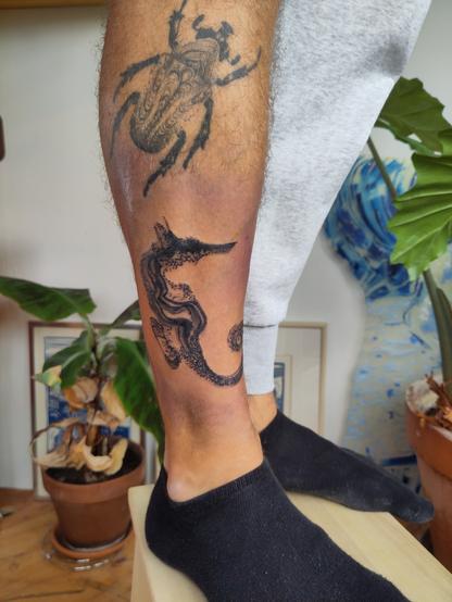 Seahorse tattoo on a lower leg