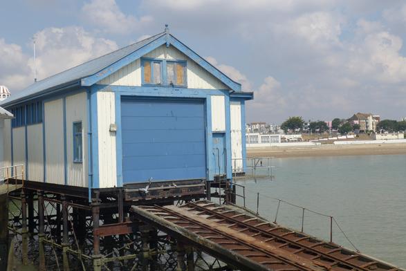 One-time lifeboat station, painted blue and white.