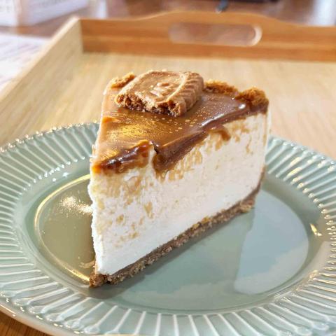A slice of Lotus/Biscoff/Cookie Butter Cheesecake from Rommana's