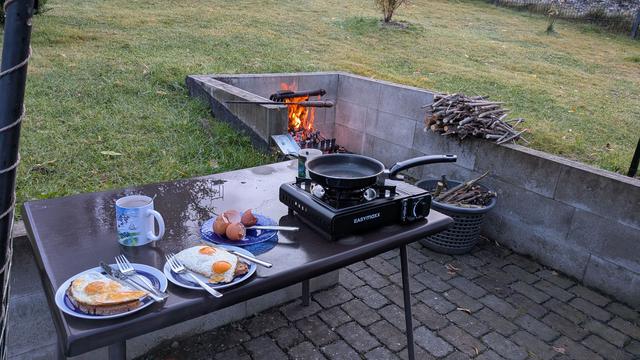 fried eggs with a fire in the background