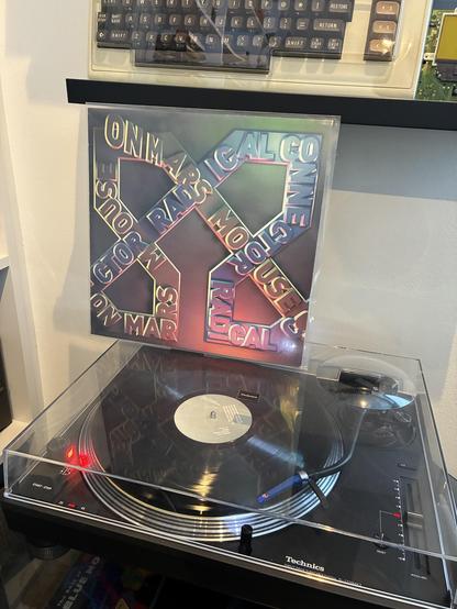 Mouse on Mars' album "Radical Connector" playing on my record player.