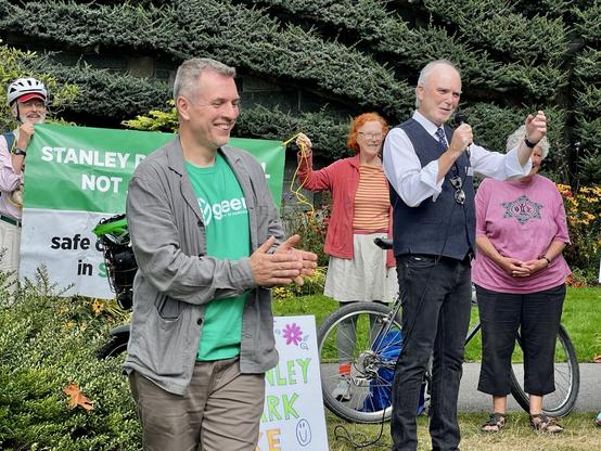 Park board commissioner Digby rallies the bike ride participants.