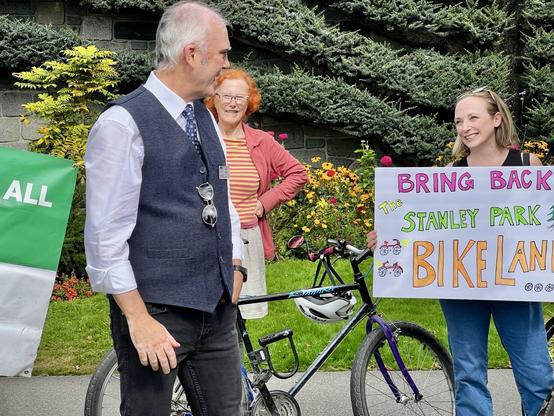 Commissioner Digby admires one of the signs for the ride.