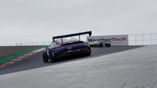 A Porsche parked the wrong way on the Corkscrew on Laguna Seca. A Ferrari barreling down from the top of the corkscrew. Nothing good will come out of this.