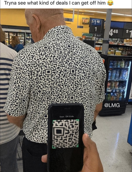 A shopper in a grocery store is seen from behind, wearing a shirt with a geometric black and white pattern that resembles QR codes. In the foreground, a hand holds a smartphone displaying a scanned QR code. The image includes humorous text about trying to find a deal.