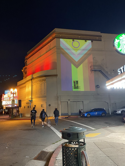 Intersectional pride flag projected in Oakland