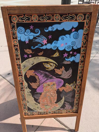 Chalk drawing of a witch cat
