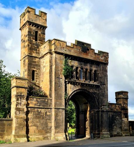 The castle-like entrance to an early Victorian cemetery in Glasgow.