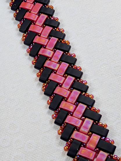 A herringbone half-tila bracelet in matte black and red.