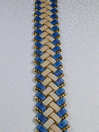 A herringbone half-tila bracelet in matte blue and beige.