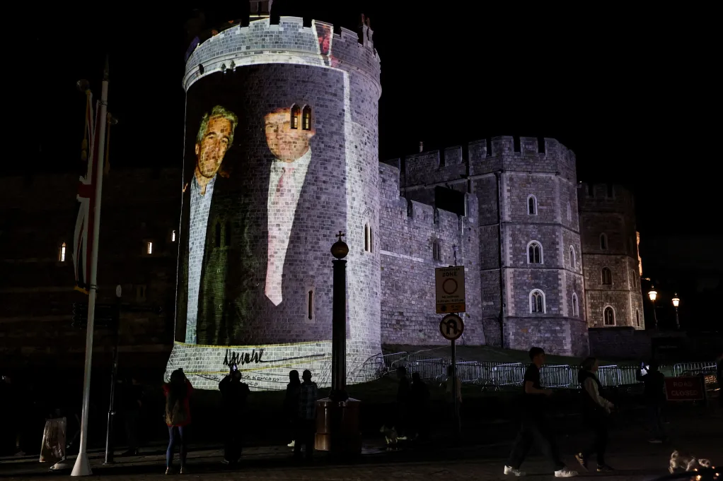 A photograph of trump and Epstein projected into the castle