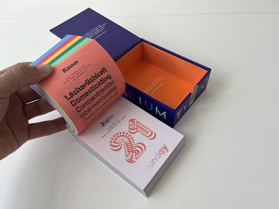 Open daily calendar with page open on Sunday June 21. Behind it, a nice box, the calendar is sold in.