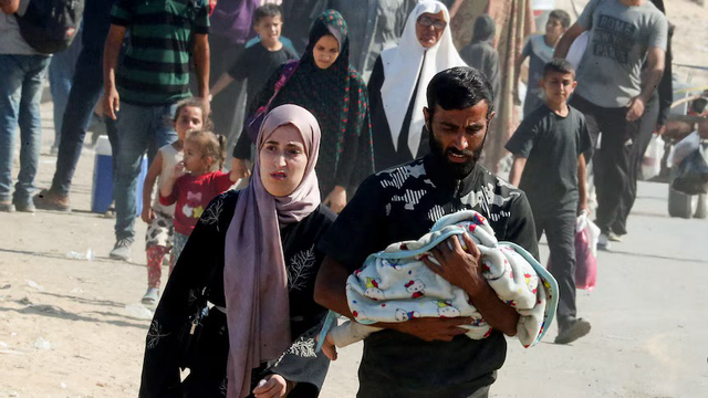 Palestinian people forced to leave their homes before bombardment by the genocidal Israeli invasion and occupation.